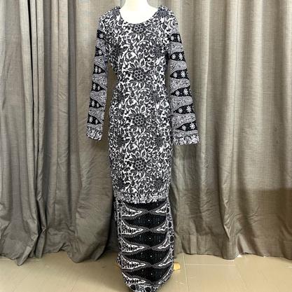 Modern baju kurung sewn in a dressmaking class