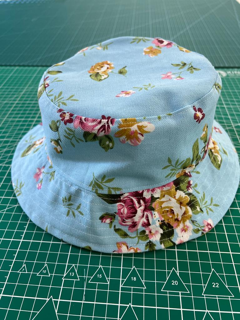 Reversible bucket hat sewn by a student